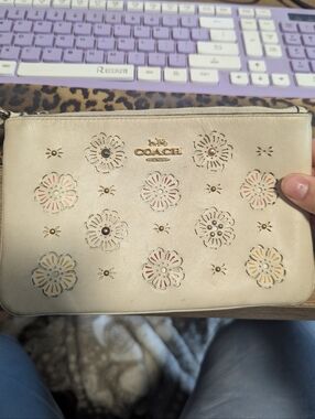 Coach Cream Leather Floral Cutout Wristlet with Gold Logo